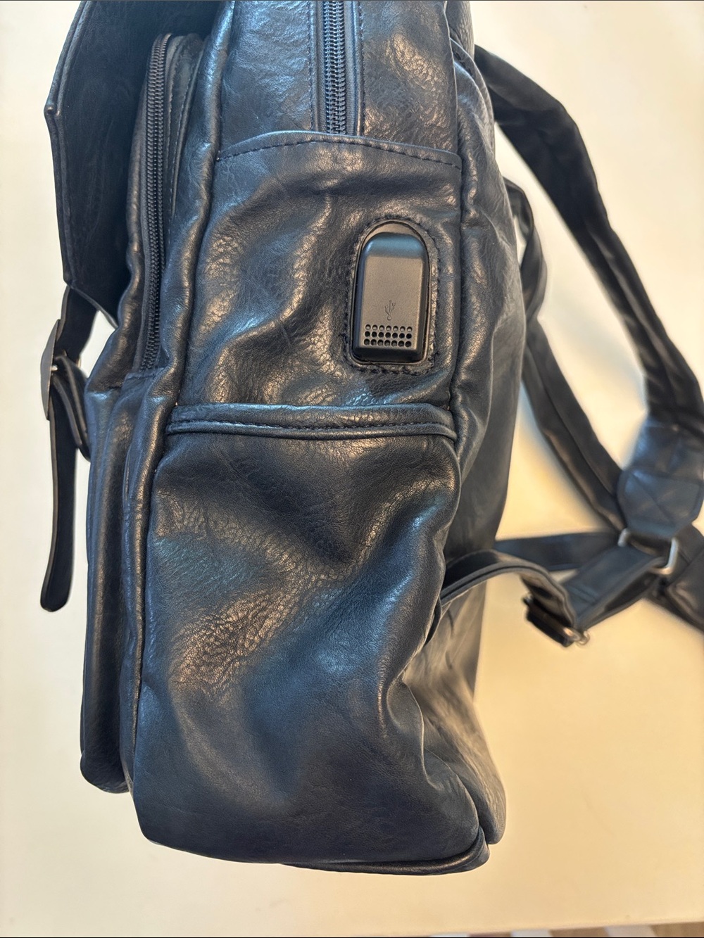 Wrangler Navy Faux Leather Backpack with Buckle Flap and laptop sleeve - Picture 3 of 4
